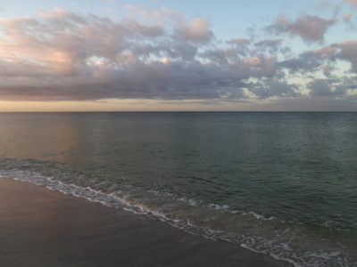The Gulf of Mexico at sunrise casts a rainbow of hues on Anna Maria Island, where the Bradenton Beach Scenic Highway runs parallel to the water. (Bradenton Beach Scenic Highway on Anna Maria Island is a waterfront highway corridor that offers nature, scenery, and pedestrian and bike-friendly paths. At 2.8 miles long, it offers panoramic views of the Gulf of Mexico and Sarasota Bay along Highway 789. It also includes access to Leffis Key, an island preserve with trails and plenty of wildlife and bird viewing.) (Bradenton Beach Scenic Highway) Photo made on 11/30/15 Photo by Lara Cerri